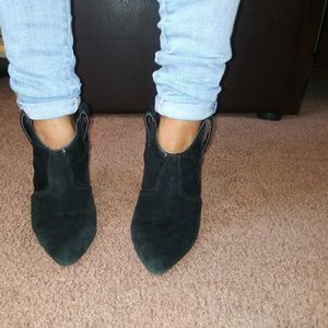 Suede black wedge booties.